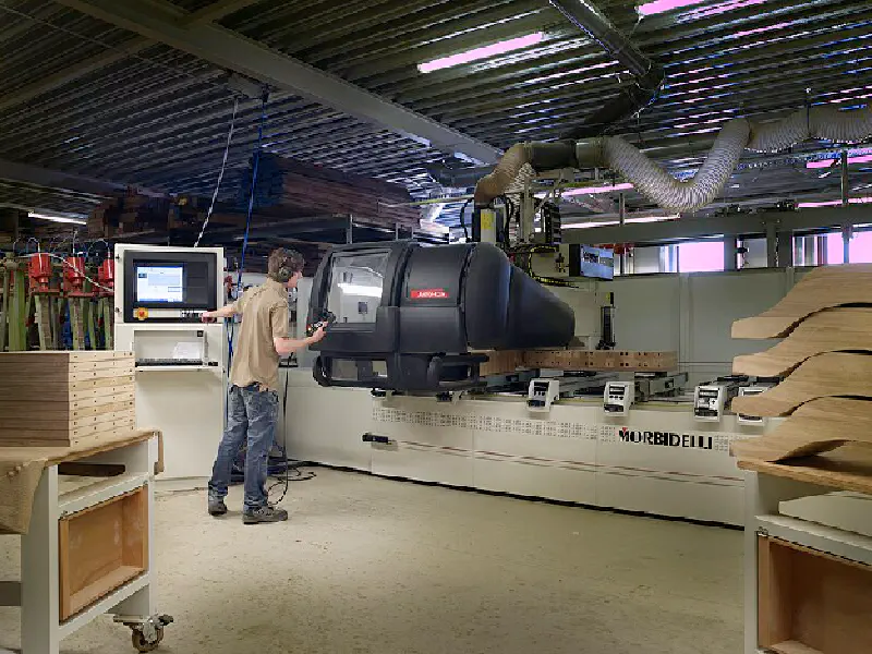 A CNC machine operating on wood